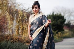 black saree with golden border